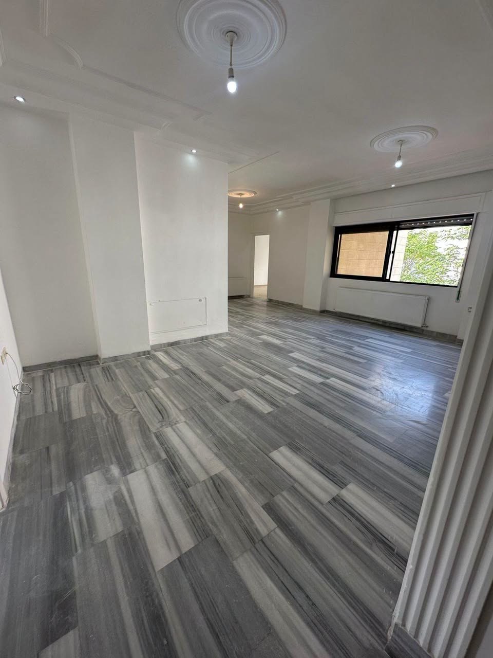 First-Floor Villa Apartment for Annual Rent in Al-Madinah Al-Munawarah Street, Amman